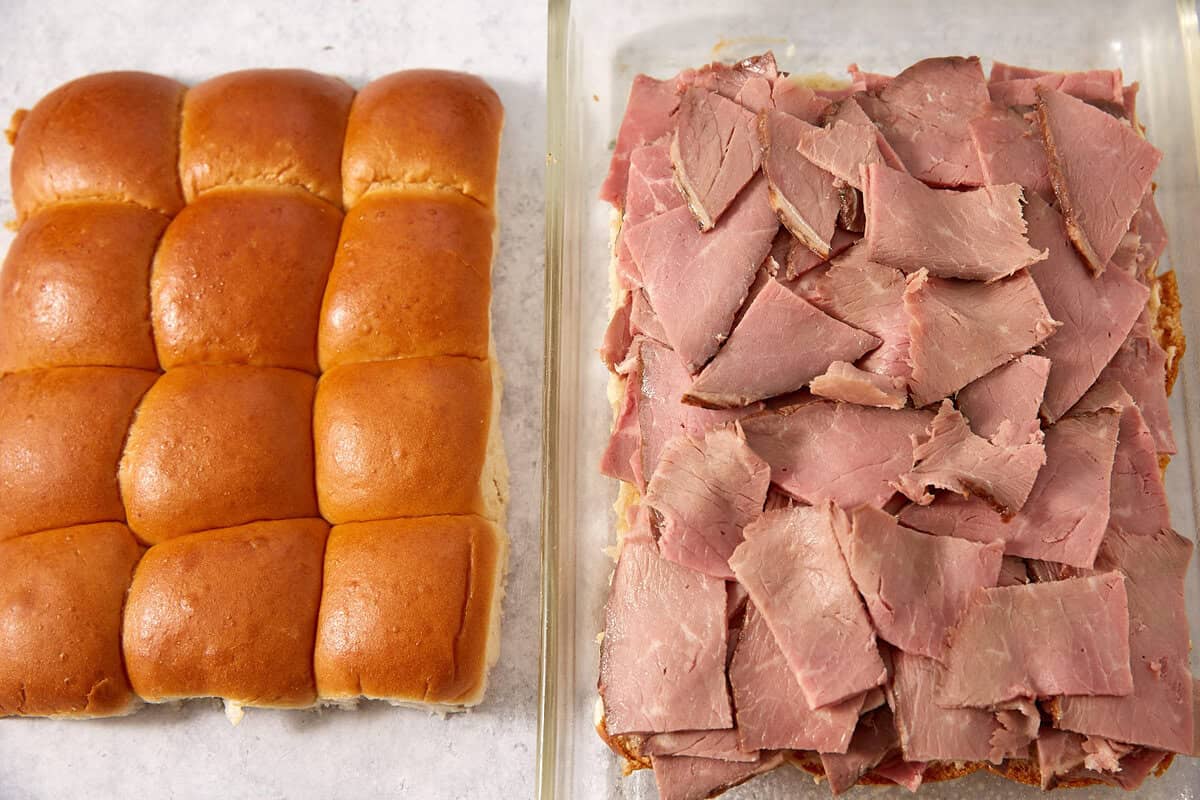 Two trays side by side: on the left, a batch of twelve golden brown sandwich rolls; on the right, slices of roast beef layered on a set of rolls with the tops removed—perfect for assembling classic French dip sliders.